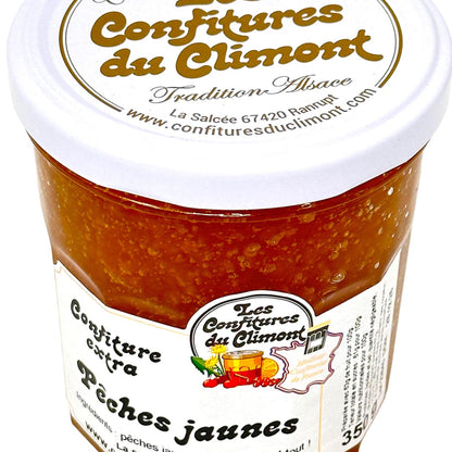 Les Confitures du Climont gelbe Pfirsich-Konfitüre extra „Pêches jaunes“ im Glas mit weißem Deckel, handwerklich hergestellte französische Konfitüre aus dem Elsass, Detailansicht des Produkts.