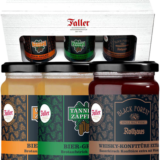 - Weiße Holzbox mit drei Faller Gläsern: Bier-Gelee und Whisky-Konfitüre, rustikal präsentiert. - Shop-optimiert mit Herkunftsbezug: Faller Genuss-Set aus dem Schwarzwald – Bier-Gelee mit Rothaus Zäpfle und Whisky-Konfitüre mit Black Forest Single Malt. - 
